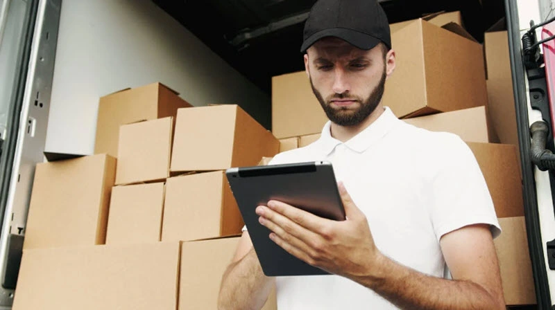 Man working with boxes